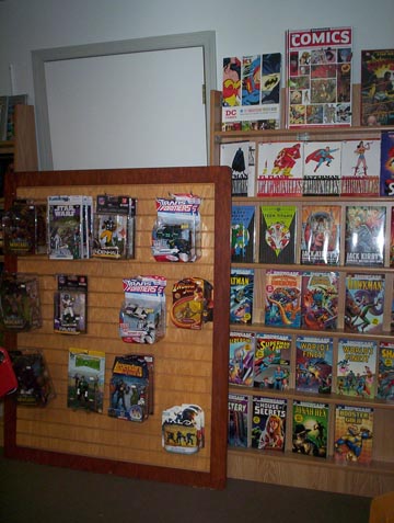 Action figures and DC Comics collections.