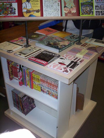 Featured manga volumes and art collections.